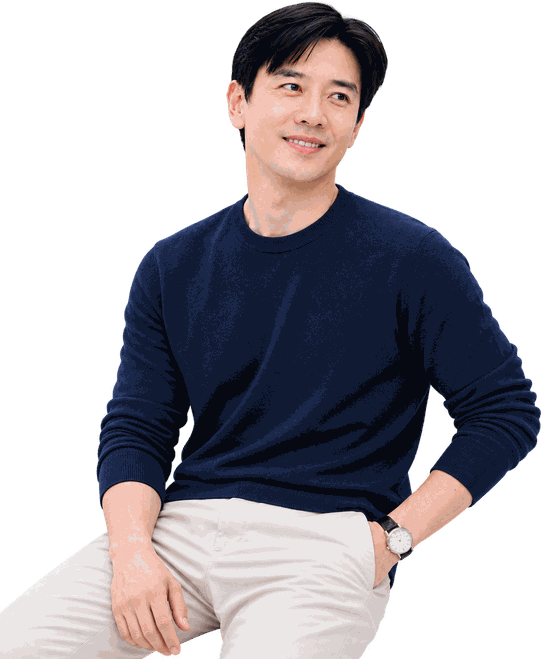 Dato Seri Ivan Teh, founder and Group CEO of Fusionex, seated in a navy sweater and looking to one side
